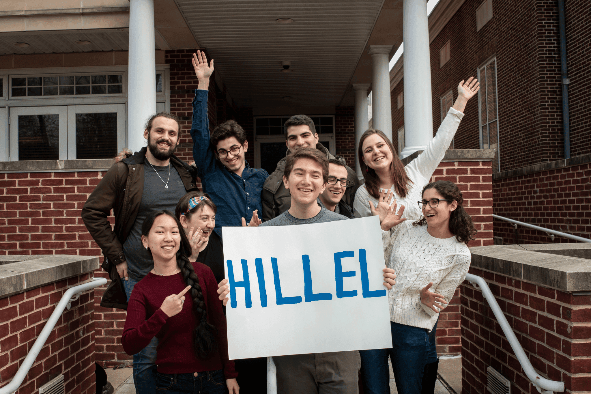Hillel students with a sign!